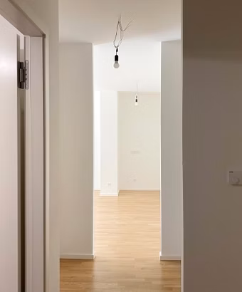 Am Winterfeldt – Berlin-Schöneberg – Diele und Garderobe mit Blick zum offenen Wohn-Küchen-Essbereich